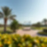 A panoramic view of a park with Dubai Frame in the background